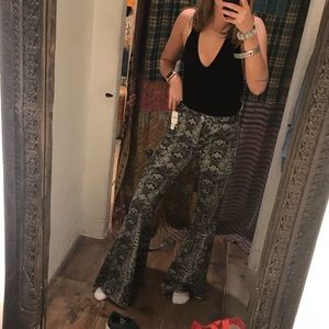 Free People Snakeskin Flare pants. Size 26.
